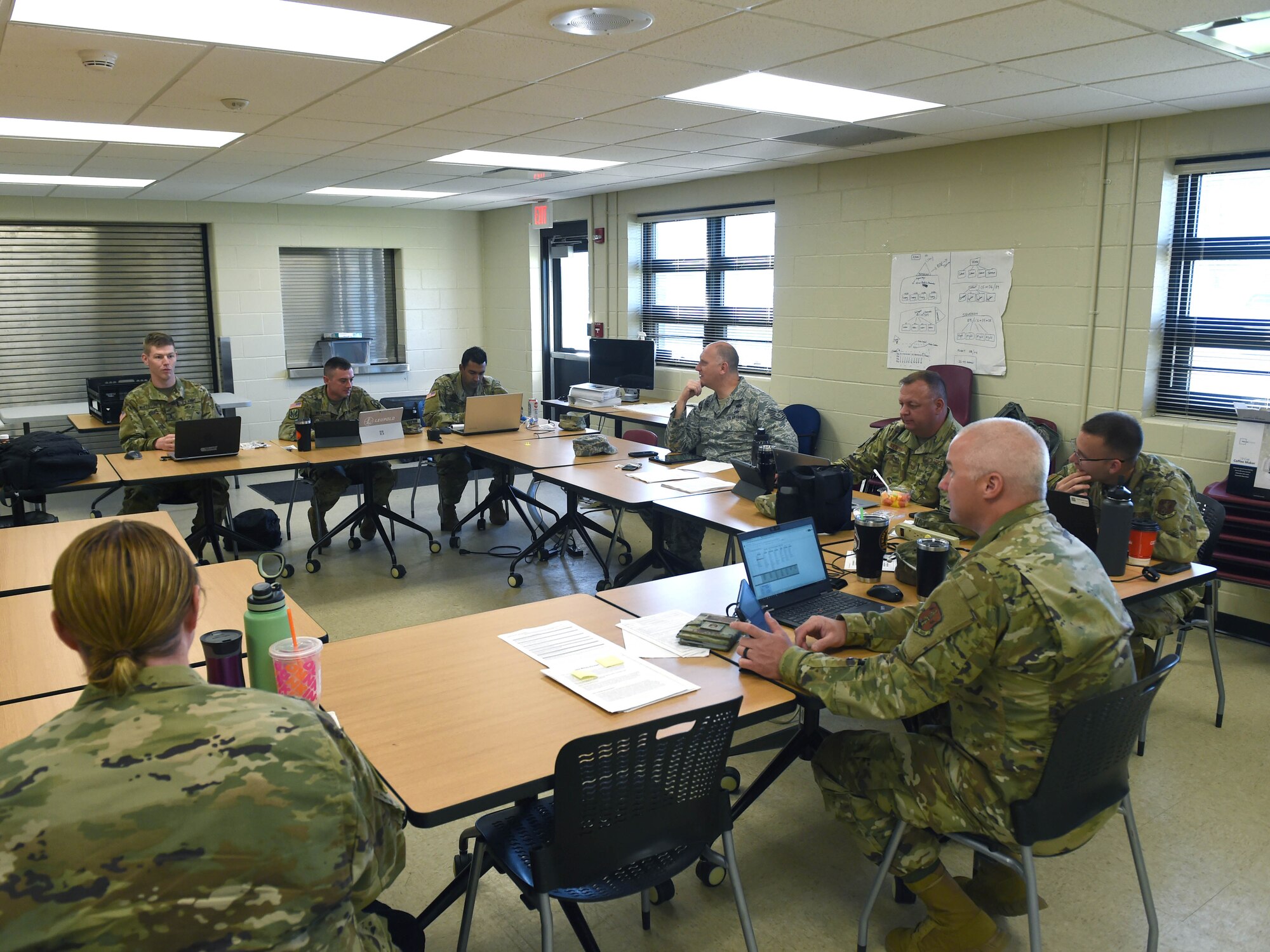 132d Wing Airmen along with Iowa Army National Guard Soldiers operate a COVID-19 contact tracing call center May 29, 2020, at Camp Dodge in Johnston, Iowa. The Airmen and Soldiers assist the Iowa Department of Public Heath in contact tracing. (U.S. Air National Guard photo by Staff Sgt. Michael J. Kelly)