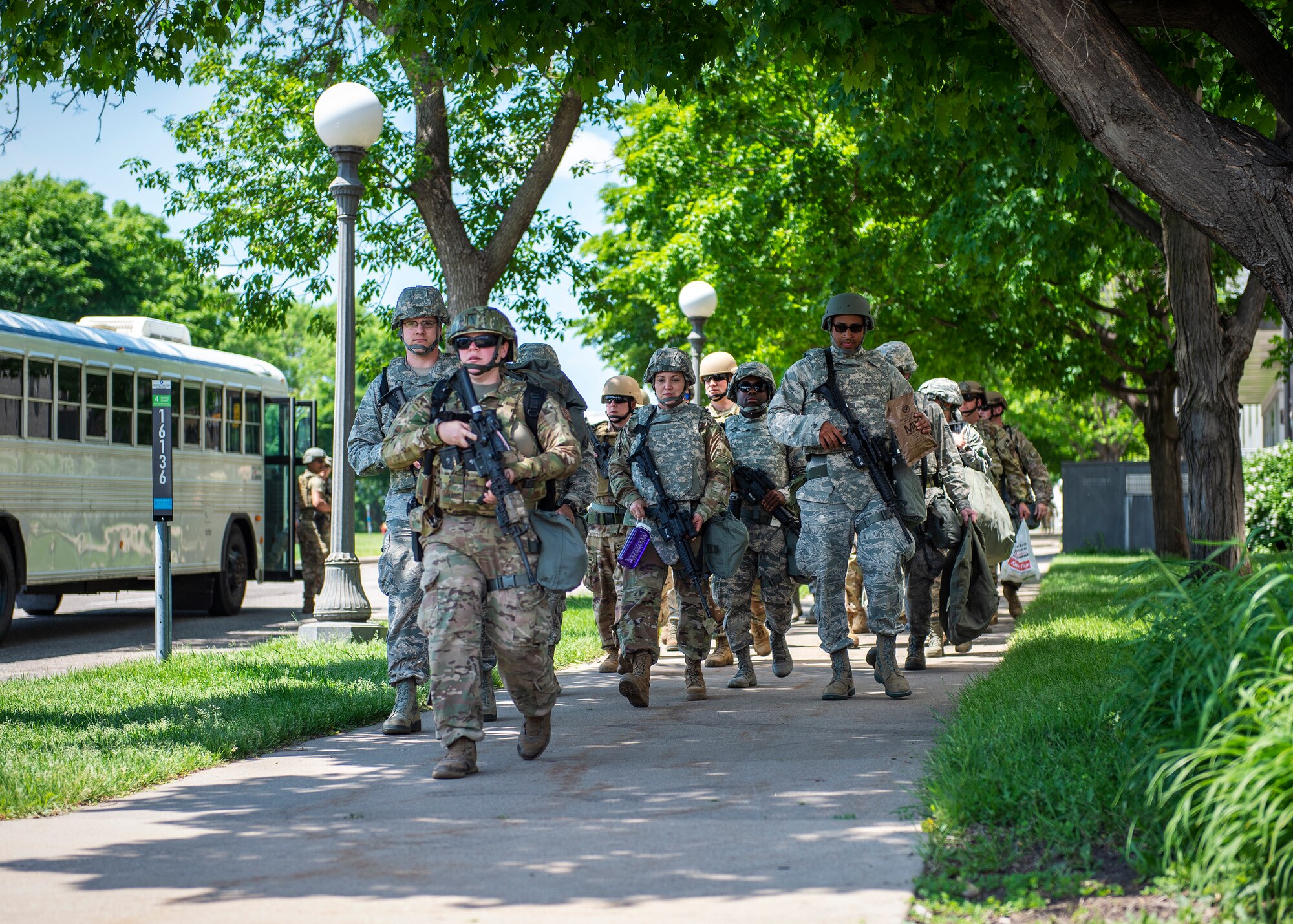 U.S. Air Force Airmen from the 133rd Airlift Wing arrive at the Minnesota State Capital grounds to perform augmentee security detail in St. Paul, Minn., June 1, 2020.