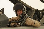 U.S. Air Force Col. Brook Leonard, commander of the 451st Expeditionary Operations Group, gives a thumbs up in a South Carolina Air National Guard F-16 prior to a daytime mission Aug. 5, 2012, from Kandahar Airfield, Afghanistan.