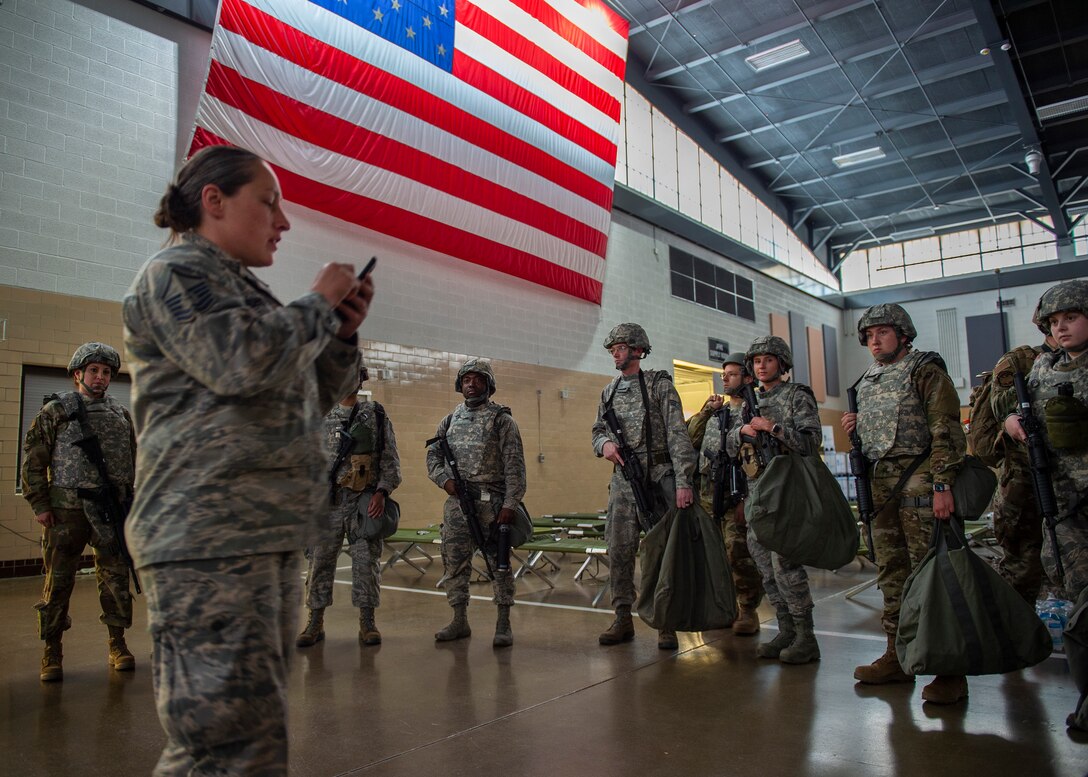 U.S. Air Force Airmen from the 133rd Airlift Wing check in at the Cedar Street armory to perform augmentee security detail in St. Paul, Minn., June 1, 2020.