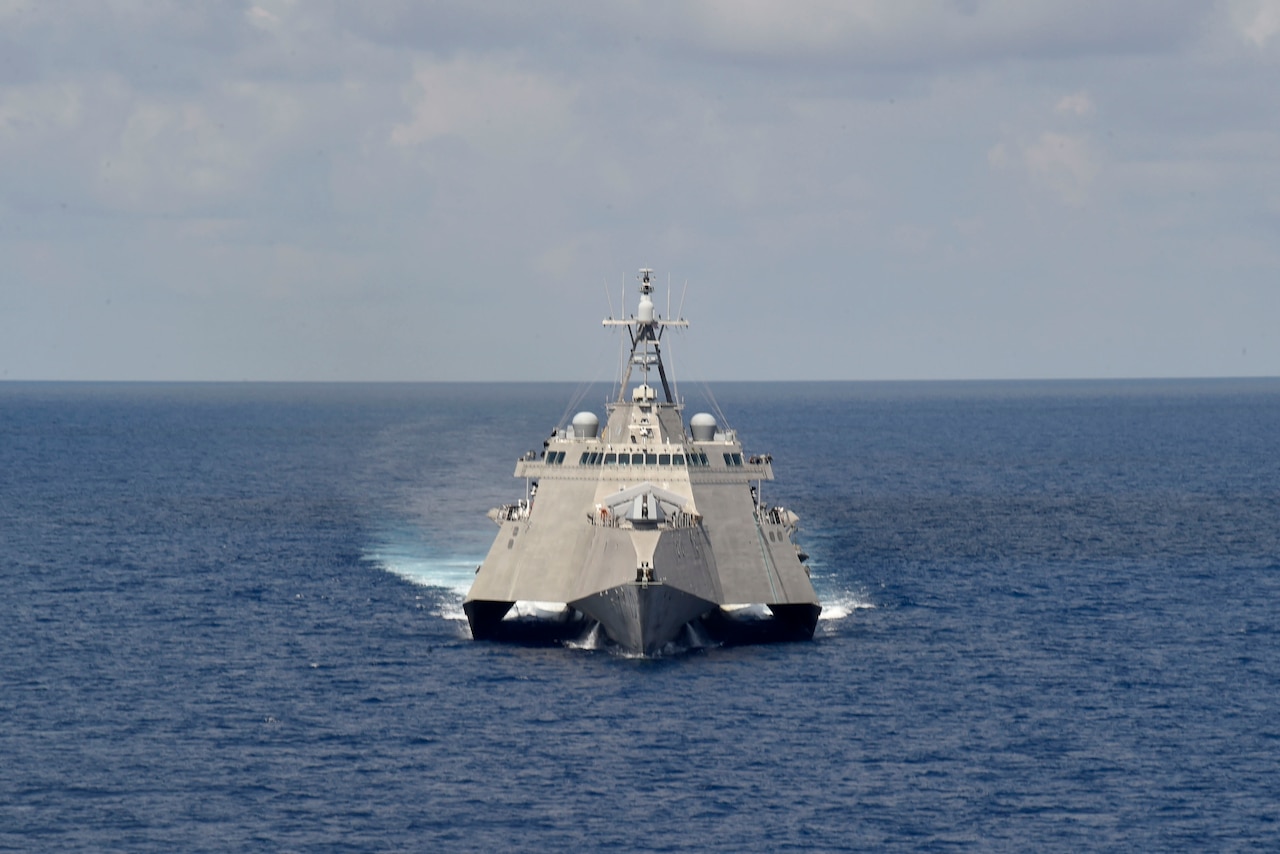 A photo shows a large ship at sea.