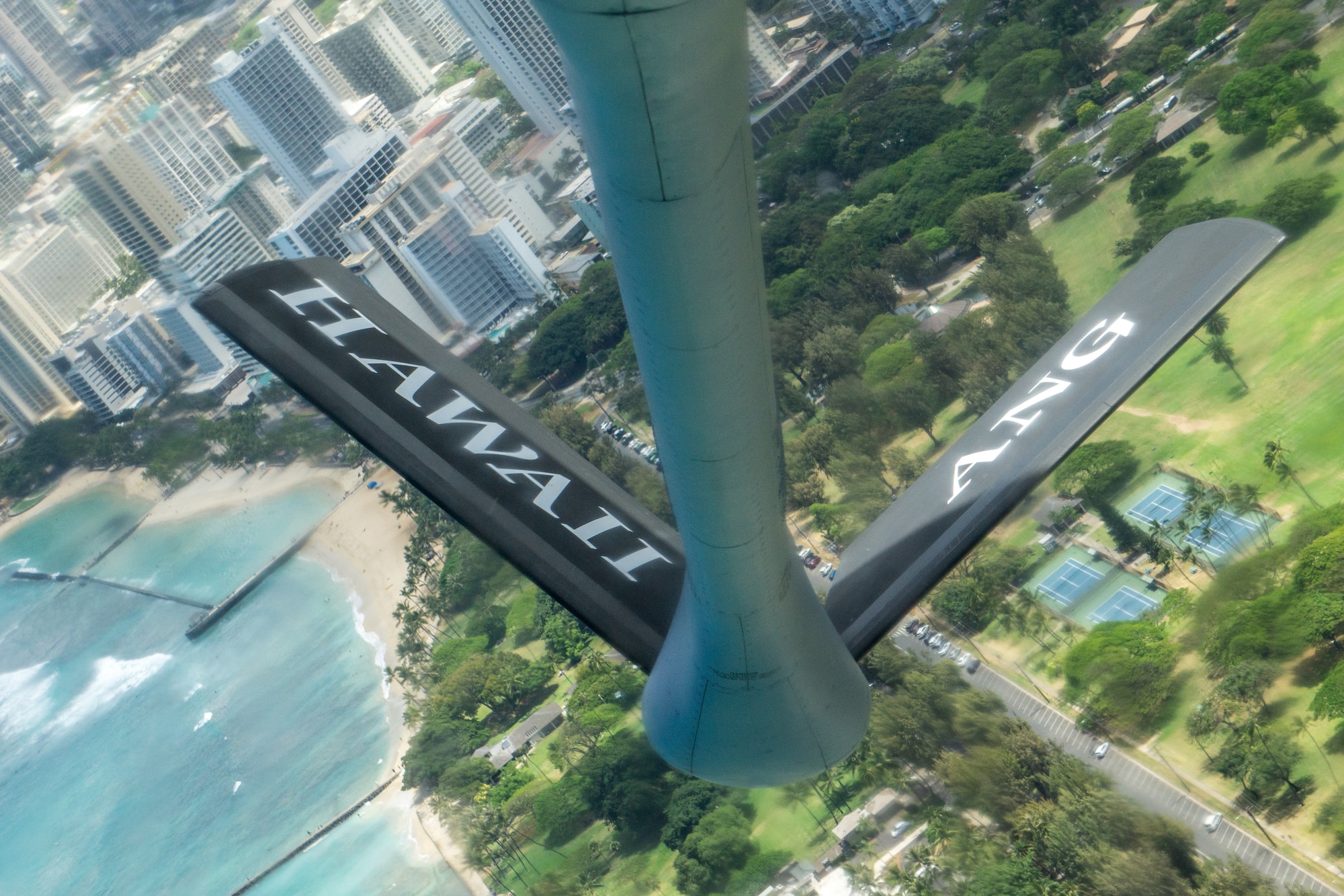 A KC-135 Stratotanker operated by Team Hickam passes over the Hawaiian Islands, May 14, 2020.