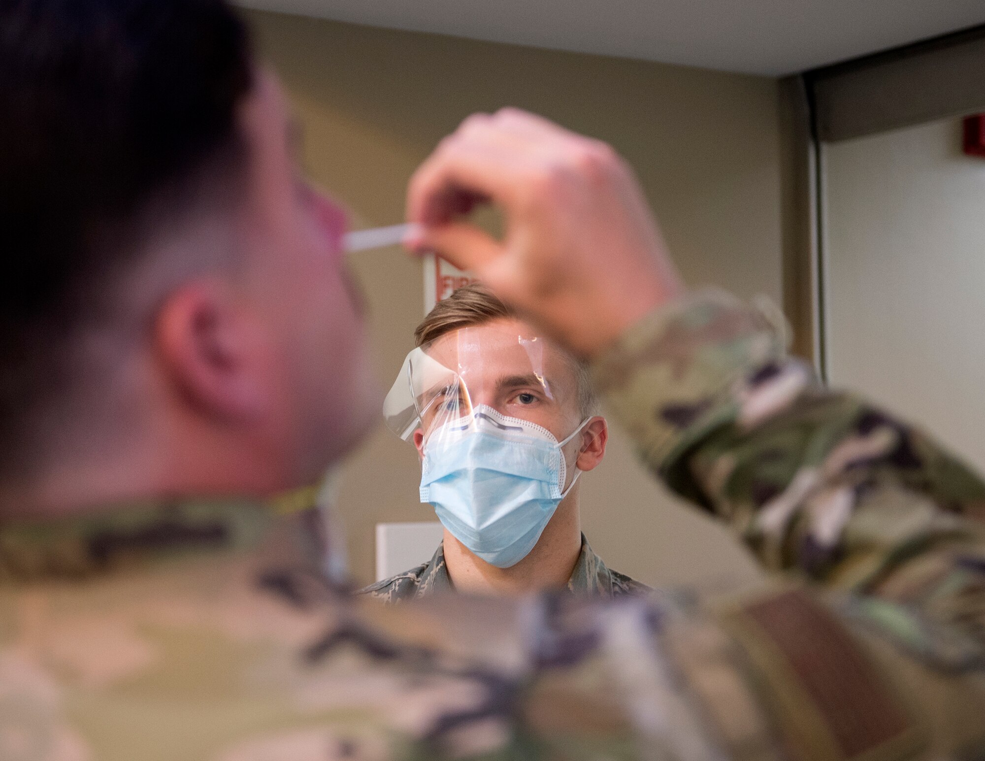 U.S. Air Force Airman from the 133rd Medical Group, oversees COVID-19 testing in St. Paul, Minnesota, June 4, 2020. The Minnesota National Guard, including the 133rd Airlift Wing, were mobilized in support of Minnesota’s Executive Order 20-64, performing patrols, manning control points, and assisting firefighters in accomplishing their lifesaving mission by providing security throughout Minneapolis, Saint Paul, and surrounding communities. (U.S. Air National Guard photo by Amy M. Lovgren)