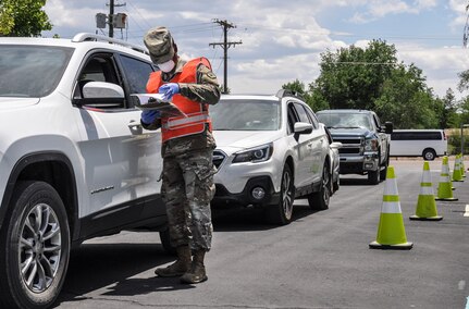 Pvt. Cinque Bradley with Task Force17 helps register local rural patients at the community based collection site, Wednesday, June 3, 2020 in Panaca, Nevada.