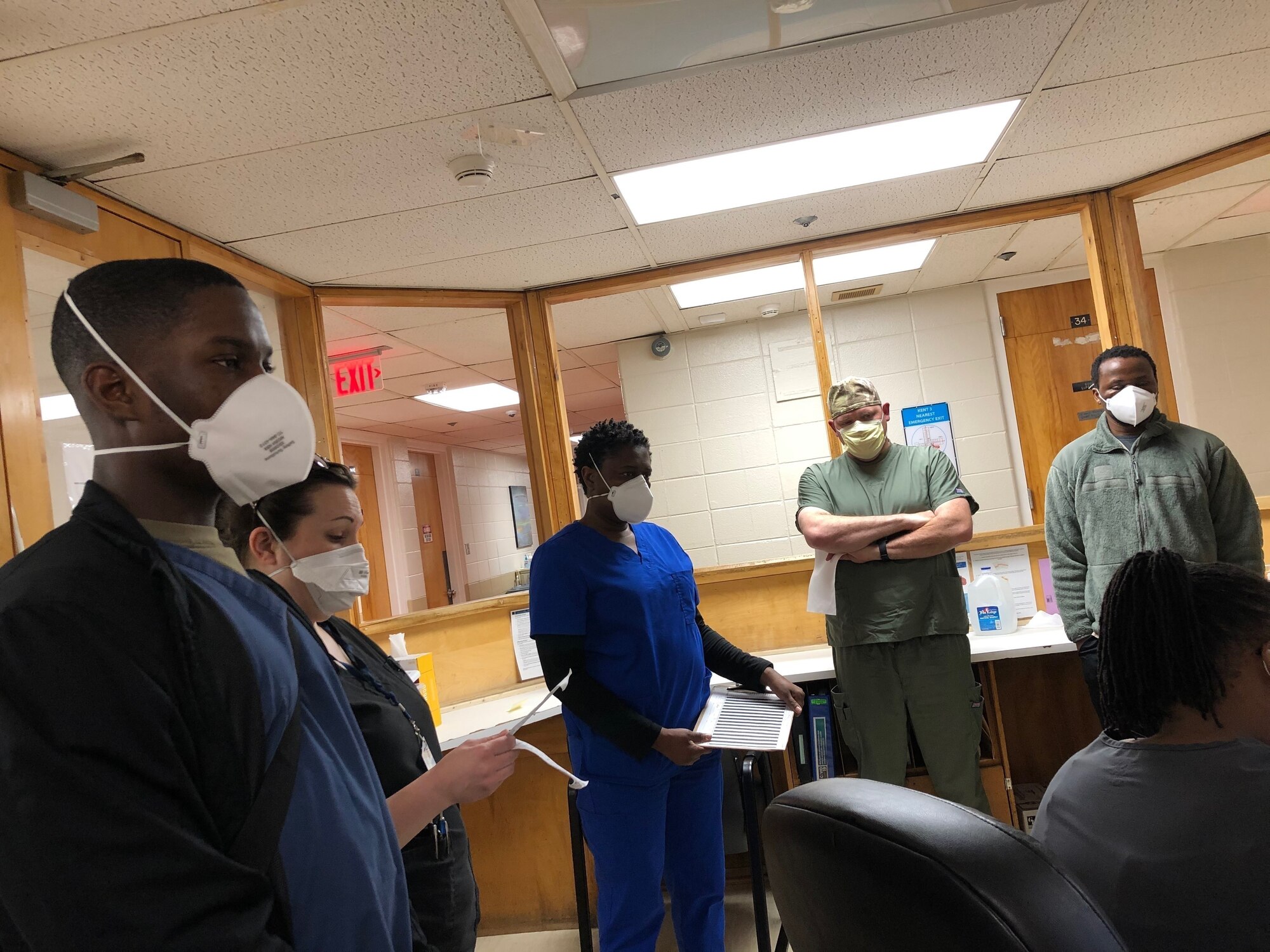 Soldiers and Airmen with the Delaware National Guard wear personal protective equipment at the Delaware Psychiatric Center in New Castle, Delaware, May 4, 2020.