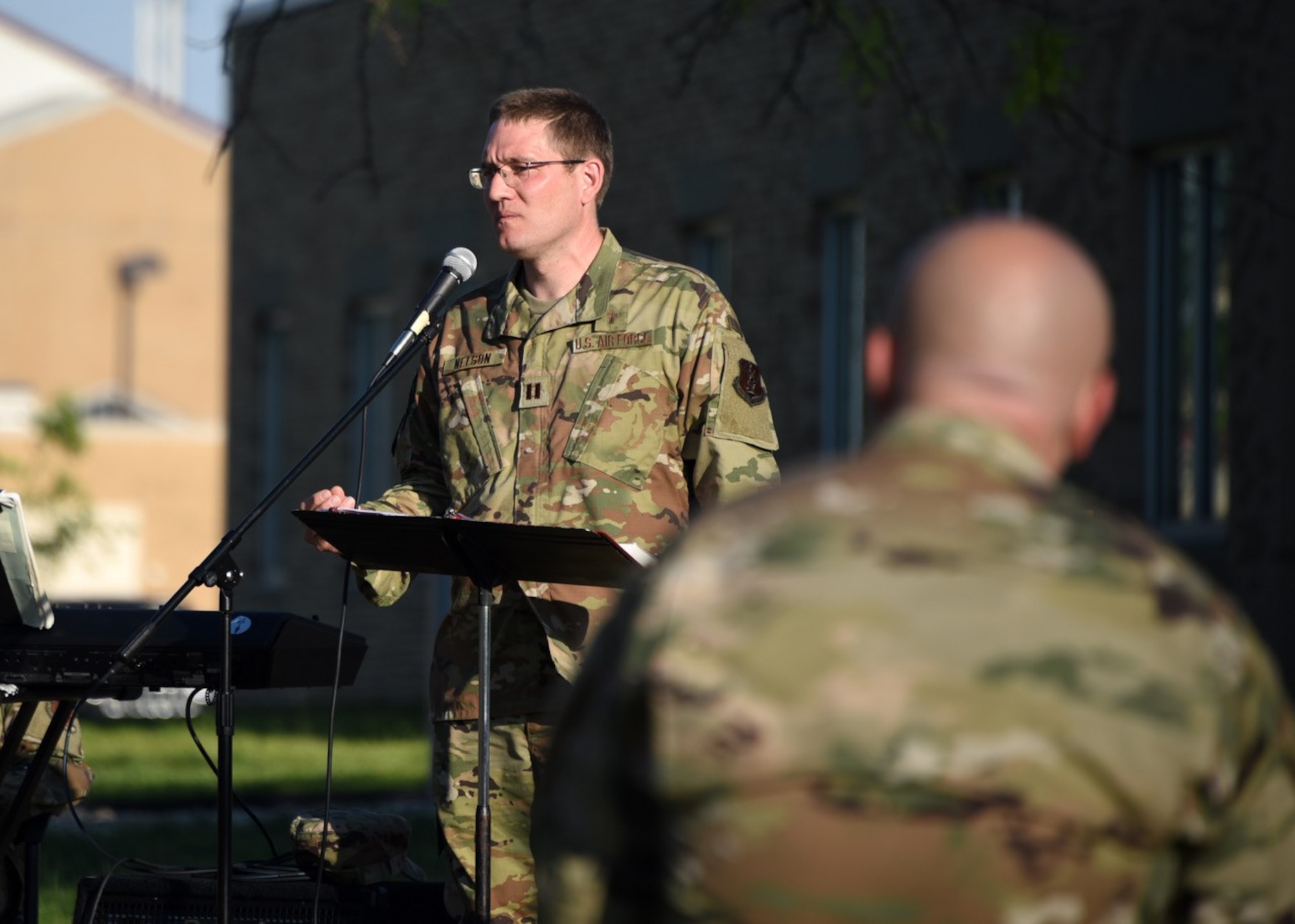 Chaplain Capt. Nelson delivers a sermon to members of the 185th Air Refueling Wing in Sioux City Iowa