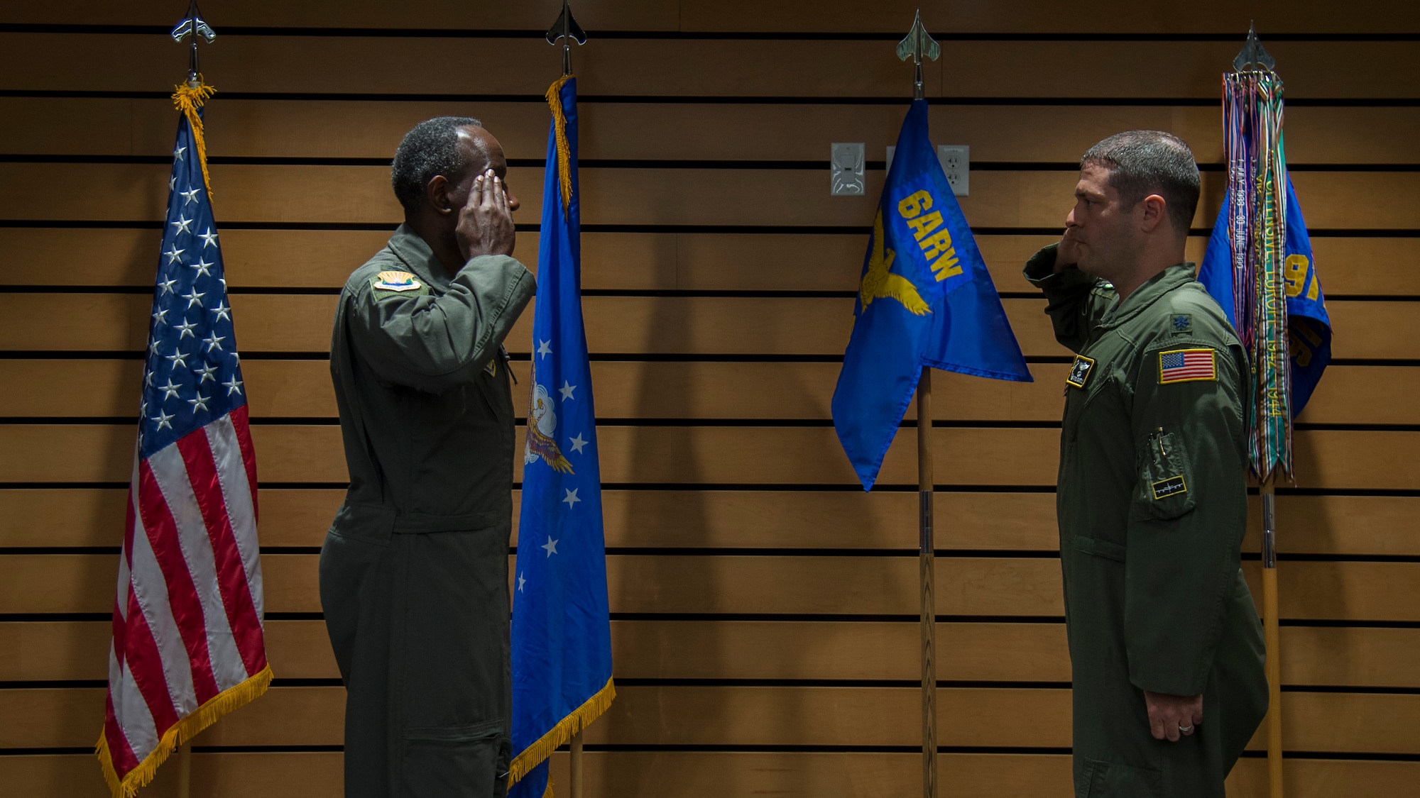 U.S. Air Force Col. Travis Edwards, the 6th Operations Group commander salutes Lt. Col. Ivan Blackwell, the 91st Air Refueling Squadron commander during a change of command ceremony, June 5, 2020, at MacDill Air Force Base, Fla.