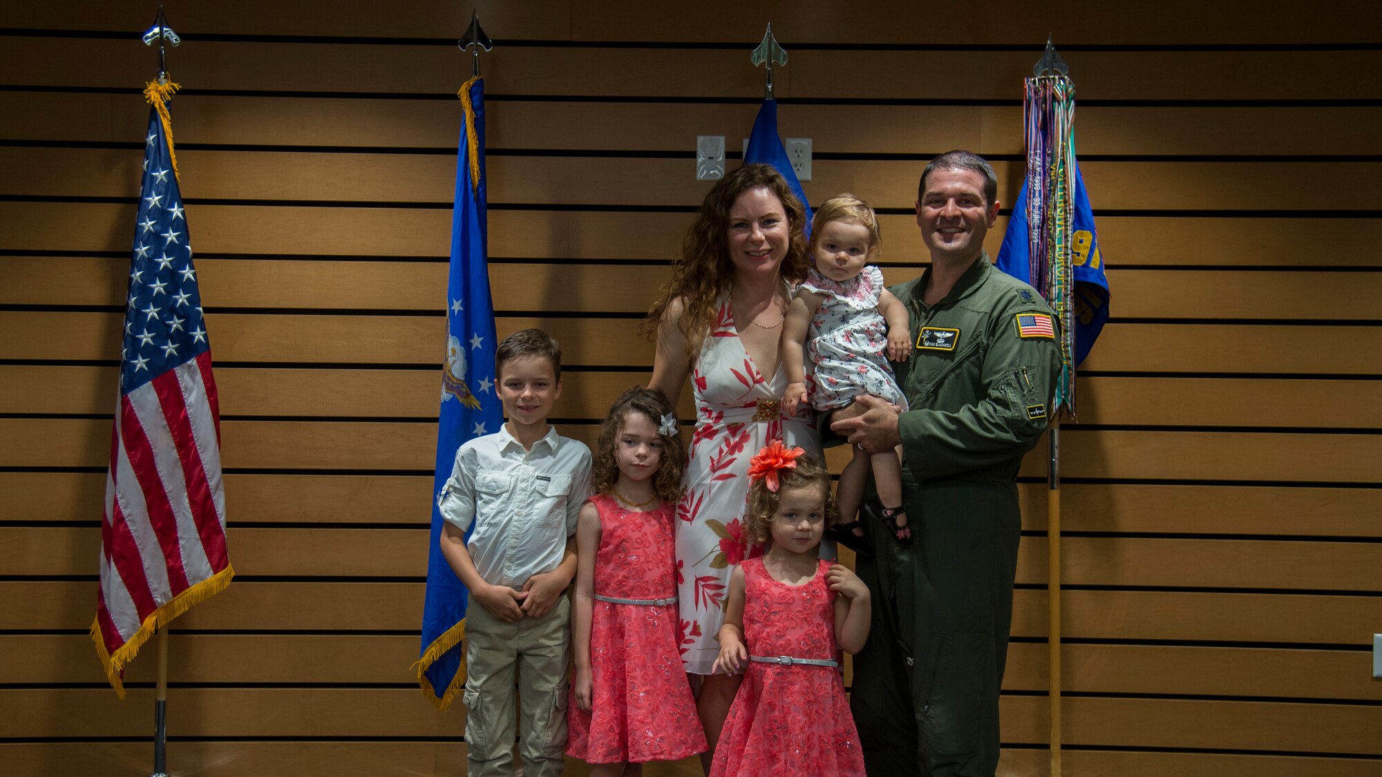 U.S. Air Force Lt. Col. Ivan Blackwell, the 91st Air Refueling Squadron commander pauses for a photo with his wife Karen, son David, and daughters Eloise, Lucia and Gracie, following a change of command ceremony, June 5, 2020, at MacDill Air Force Base, Fla.
