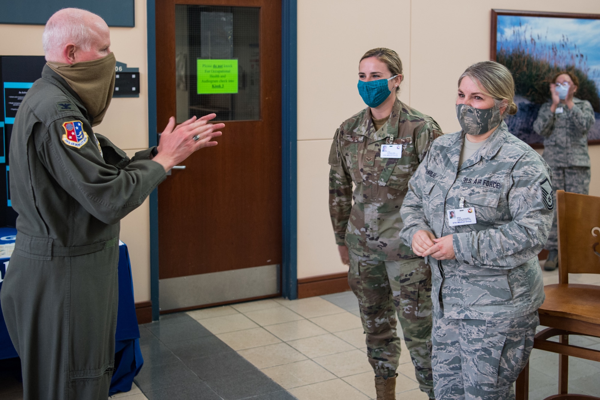 U.S. Air Force Reserve Col. Thomas O. Pemberton, 514th Air Mobility Wing commander, recoginizes the actions of reservists from the 514th Aerospace Medicine Squadron, on Joint Base McGuire-Dix-Lakehurst, N.J., June 6, 2020.