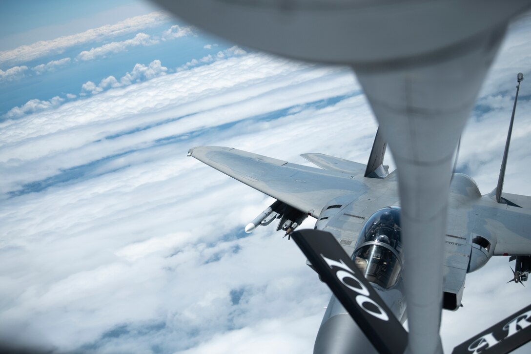 An F-15C Eagle assigned to the 48th Fighter Wing, RAF Lakenheath, England, prepares to receive fuel from a KC-135 Stratotanker assigned to the 100th Air Refueling Wing, RAF Mildenhall, England, before a formation flight supporting the 76th anniversary commemoration off the French coast, June 6, 2020. An epic multinational operation, D-Day forged partnerships and reinforced trans-Atlantic bonds that remain to this day. (U.S. Air Force photo by Tech. Sgt. Emerson Nuñez)