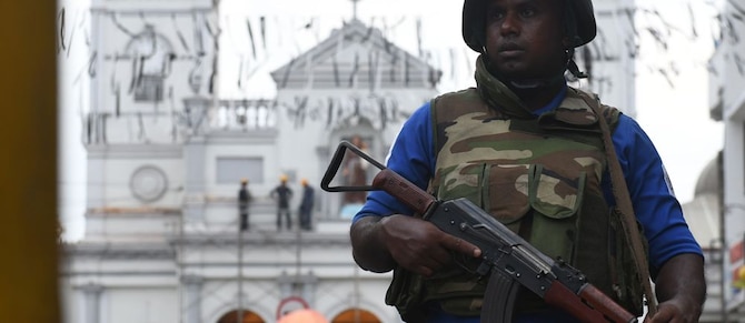 A Sri Lankan security officer stands guard in the aftermath of the 2019 Easter attacks