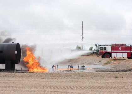 Airmen with the Gowen Field Fire Department train to extinguish aircraft fires at a local fire department training site, June 6, 2020, Boise, Idaho. This training prepares the unit to fight live fires during runway emergencies.