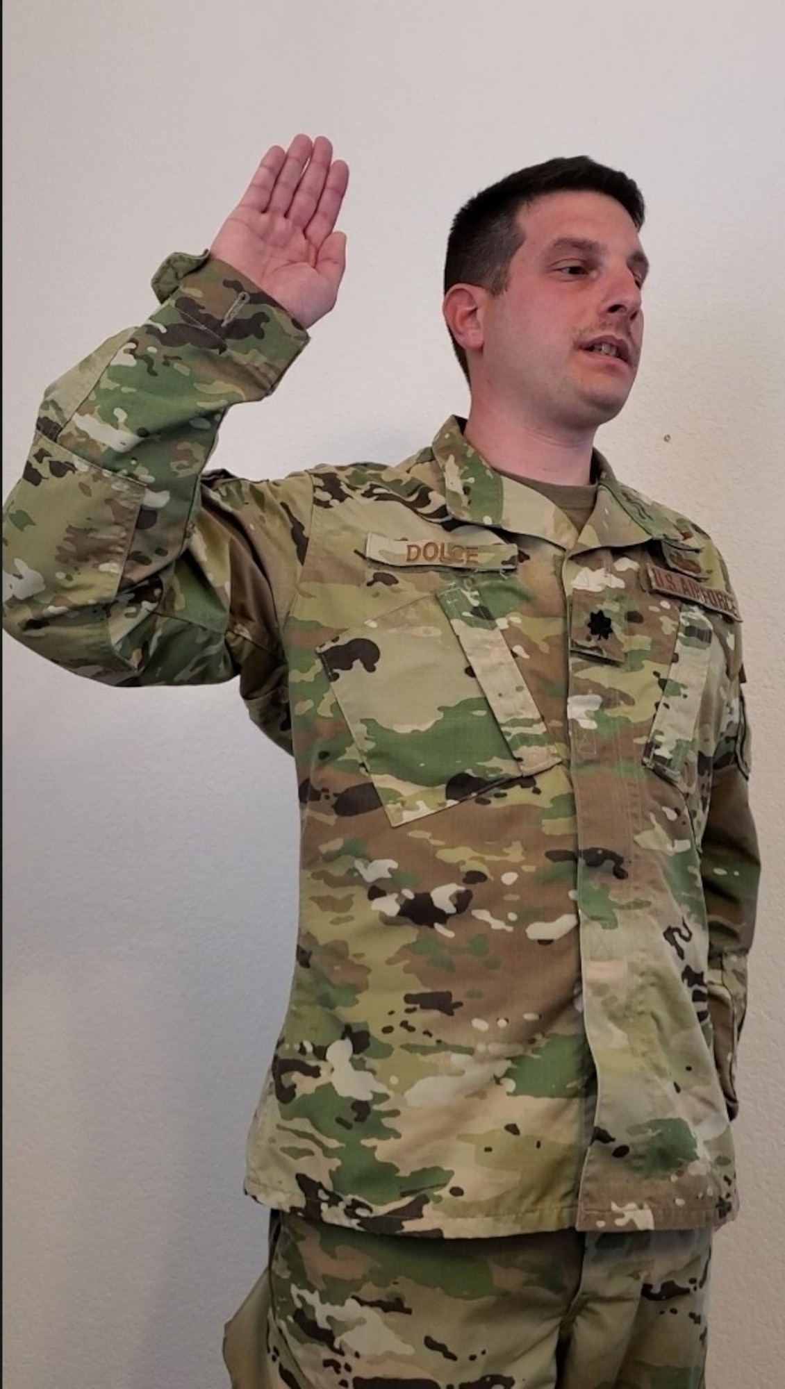Paul Dolce, commander of the 586 Flight Test Squadron at White Sands Missile Range, New Mexico, is promoted to the rank of lieutenant colonel during a virtual ceremony March 31. Dolce’s oath of office was read to him by his twin brother, Lt. Col. Joseph Dolce, program manager for Cloud One at Hanscom Air Force Base, Mass., who was promoted March 27.