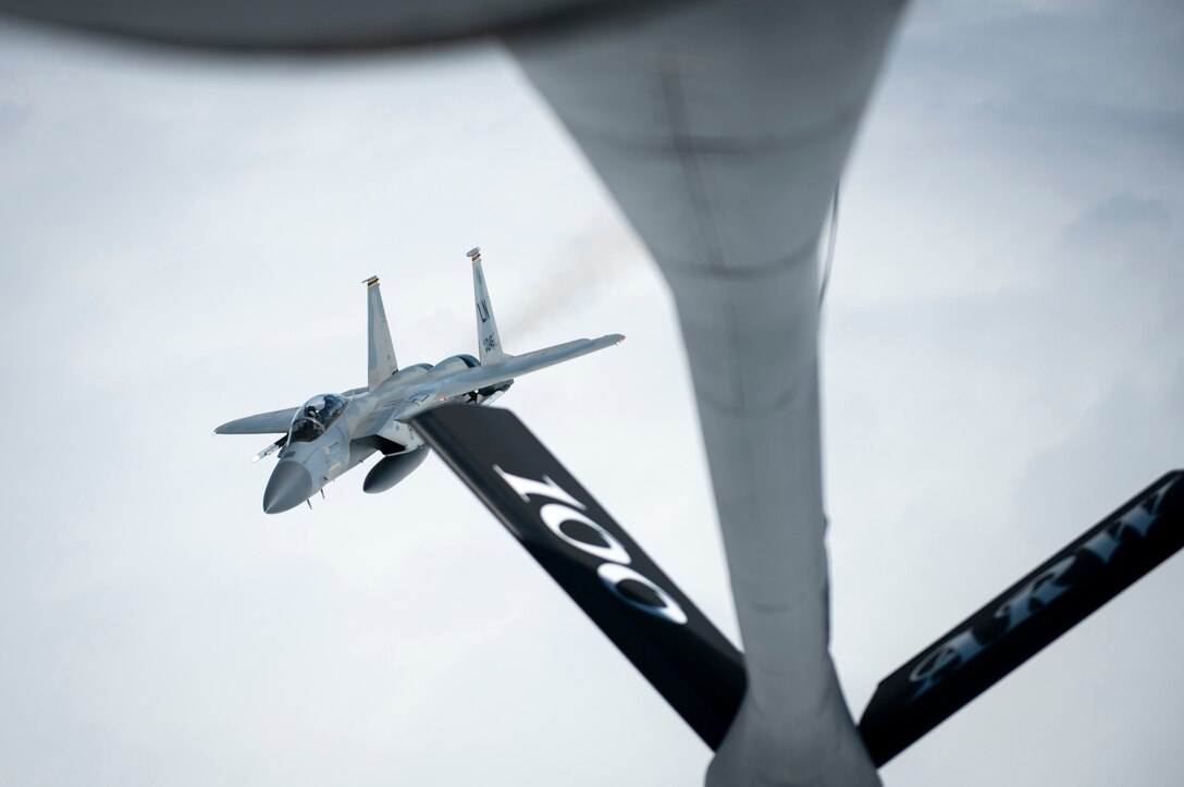 An F-15C Eagle assigned to the 48th Fighter Wing, RAF Lakenheath, England, breaks off after receiving fuel from a KC-135 Stratotanker assigned to the 100th Air Refueling Wing, RAF Mildenhall, England, before a formation flight supporting the 76th anniversary commemoration of D-Day off the French coast, June 6, 2020. As seen during World War II, no nation can confront combat operations alone – and U.S. European Command with its subordinate components remain engaged, postured and ready to respond to threats as they arise. (U.S. Air Force photo by Tech. Sgt. Emerson Nuñez)