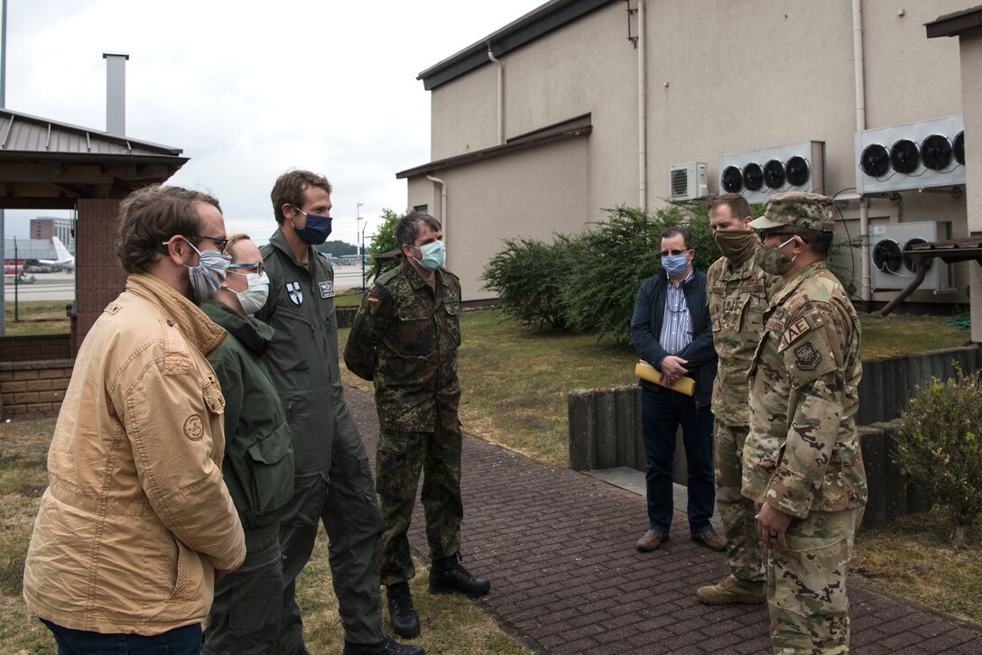U.S. Air Force Airmen assigned to the 521st Air Mobility Operations Wing meet with medical professionals from the German air force.
