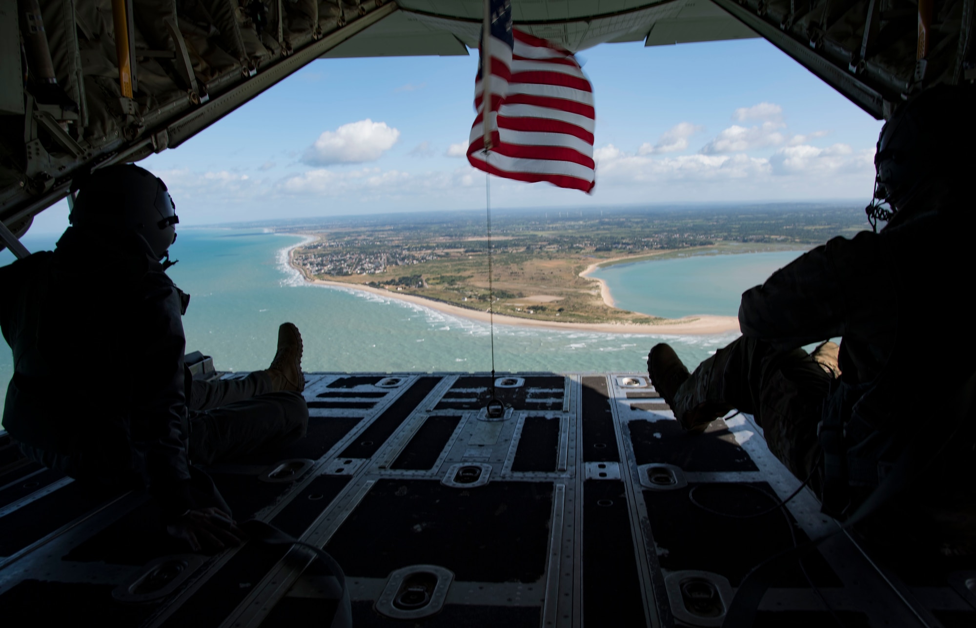 A photo of Airmen watching the ocean