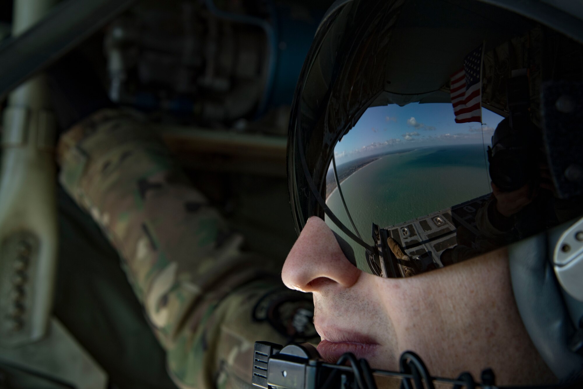 A photo of an Airman watching the ocean.
