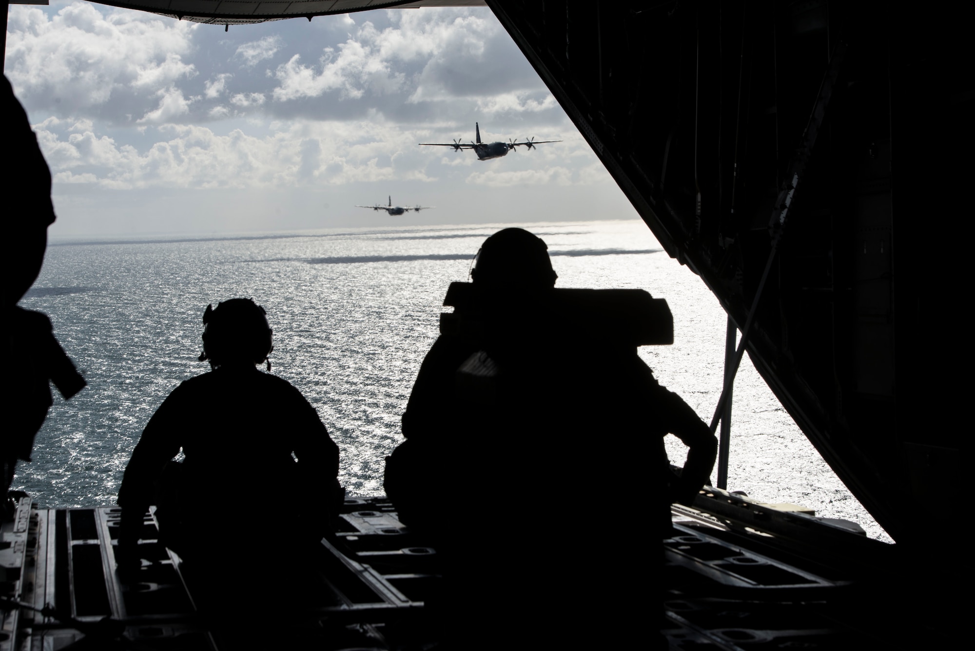 A photo of Airmen watching the ocean