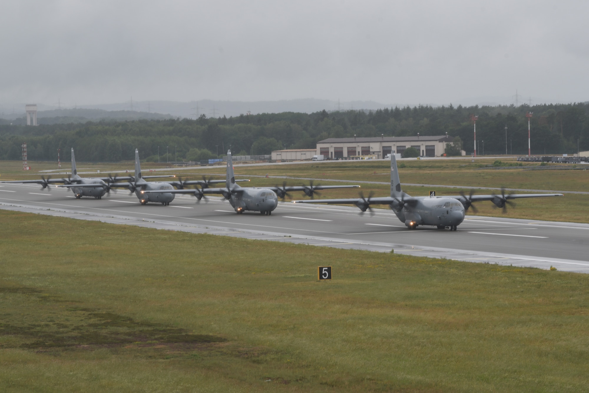 A photo of aircraft lining up for takeoff