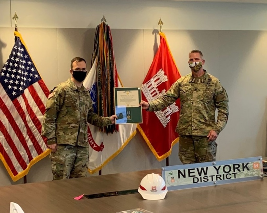First Lt. Eoghan M. Matthews receives the Army Achievement Medal for his contributions during a deployment to New York City to assist the U.S. Army Corps of Engineers New York District with construction of several alternate care facilities in the fight against COVID-19.