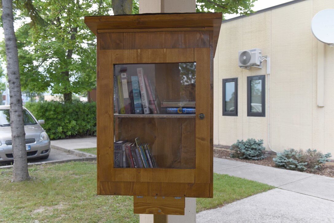 Books sit on the shelves of a new book exchange library during a ribbon cutting ceremony at Aviano Air Base, Italy, June 2, 2020. Airmen from the 606th Air Control Squadron built the book exchange library to cultivate a spirit of generosity and build up communities. The accessibility to the book exchange library during all hours of the day, aids the busy lives of Airmen on various schedules.(U.S. Air Force photo by Staff Sgt. Valerie Halbert)