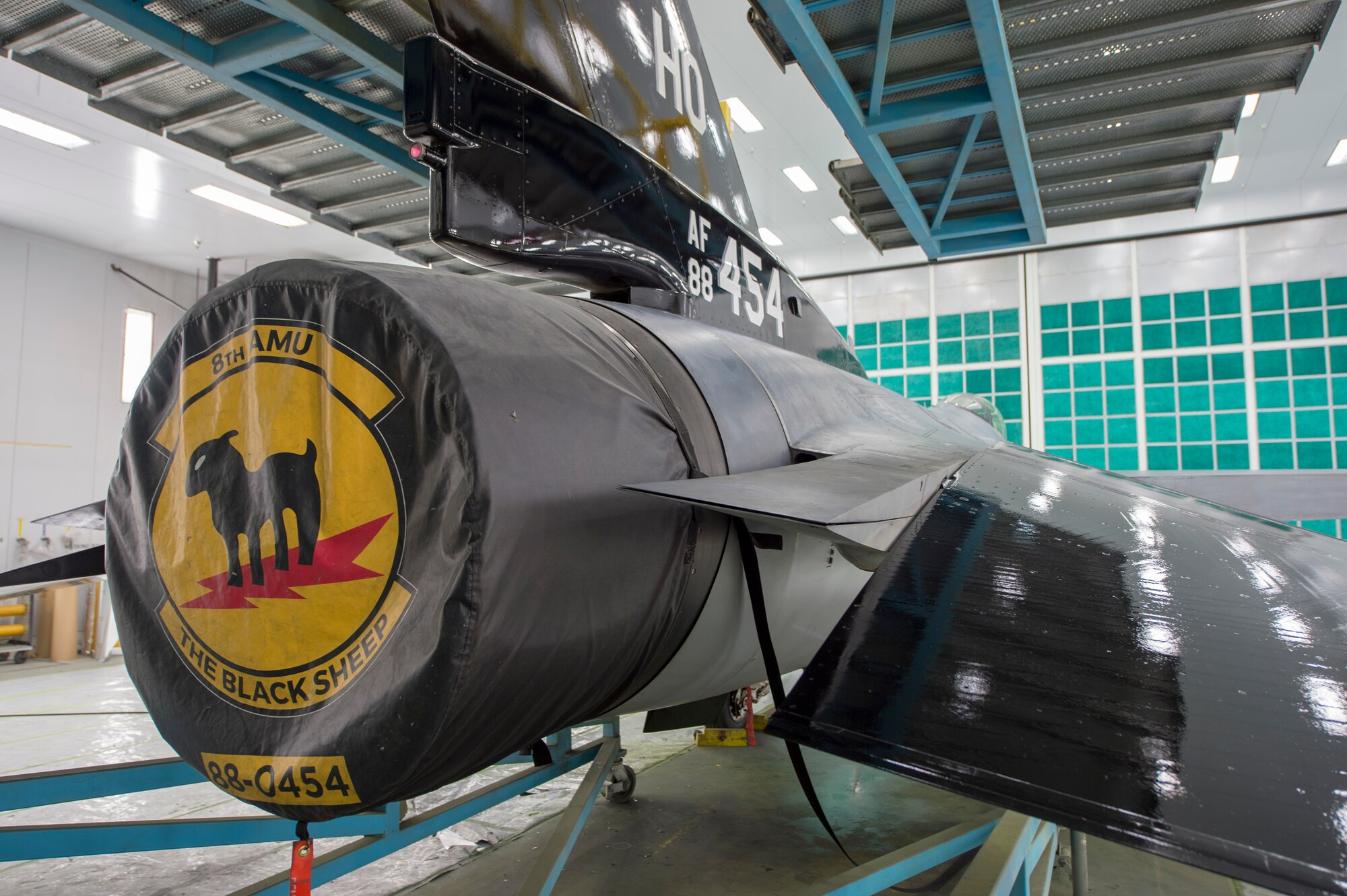 The 8th Aircraft Maintenance Unit F-16 Viper flagship sits at the 8th AMU, June 4, 2020, on Holloman Air Force Base, N.M. The aircraft received a repaint which is a long-standing tradition that allows the aircraft to be showcased with distinguishing and identifiable markings of their respective unit. (U.S. Air Force photo by Senior Airman Collette Brooks)