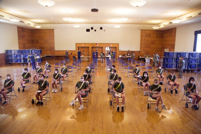 Poolees are medically tested for COVID-19 at The Citadel, a public military college temporarily utilized to stage poolees for a 14-day observation period in Charleston, S.C., May 5, 2020.