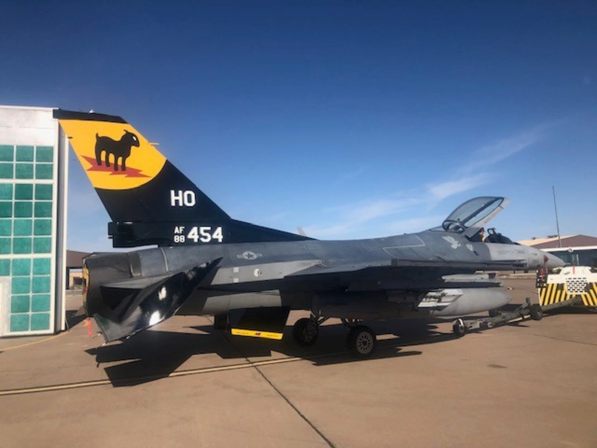 The 8th Aircraft Maintenance Unit F-16 Viper flagship sits at the 8th AMU, June 5, 2020, on Holloman Air Force Base, N.M. The aircraft received a repaint which is a long stand tradition that allows the aircraft to be showcased with distinguishing and identifiable markings of their respective unit. (Courtesy photo by Tech. Sgt. William Garcia)