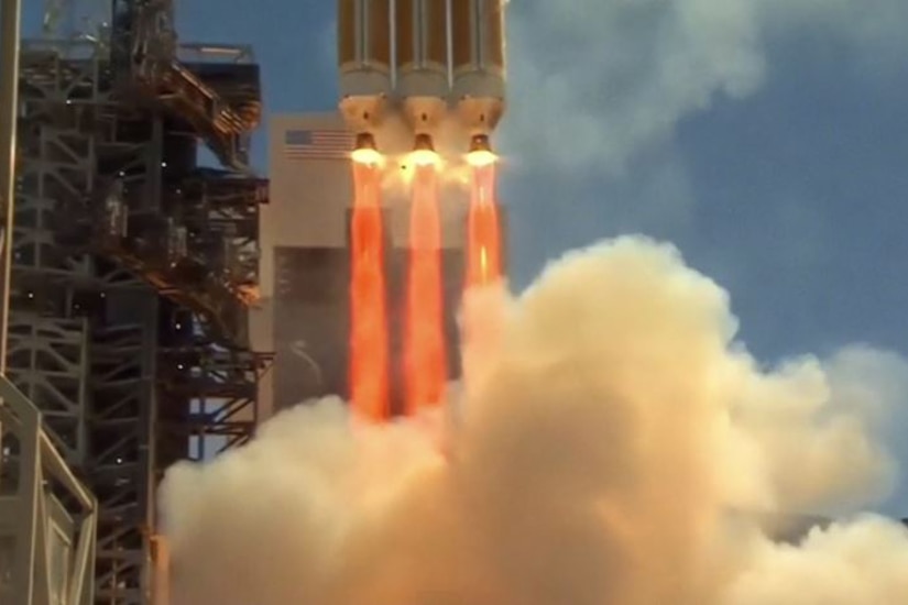 A rocket lifts off into space.