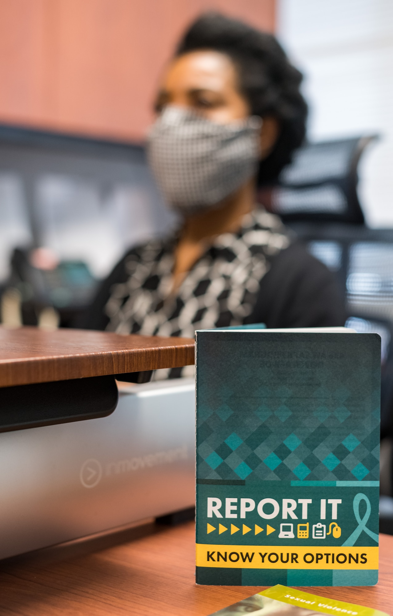 Gail Reed-Attoh, 436th Airlift Wing Sexual Assault Response Coordinator, works at her desk, May 29, 2020, at Dover Air Force Base, Delaware. Reed-Attoh and two alternate SARCs are available 24/7 to support sexual assault victims. (U.S. Air Force photo by Roland Balik)