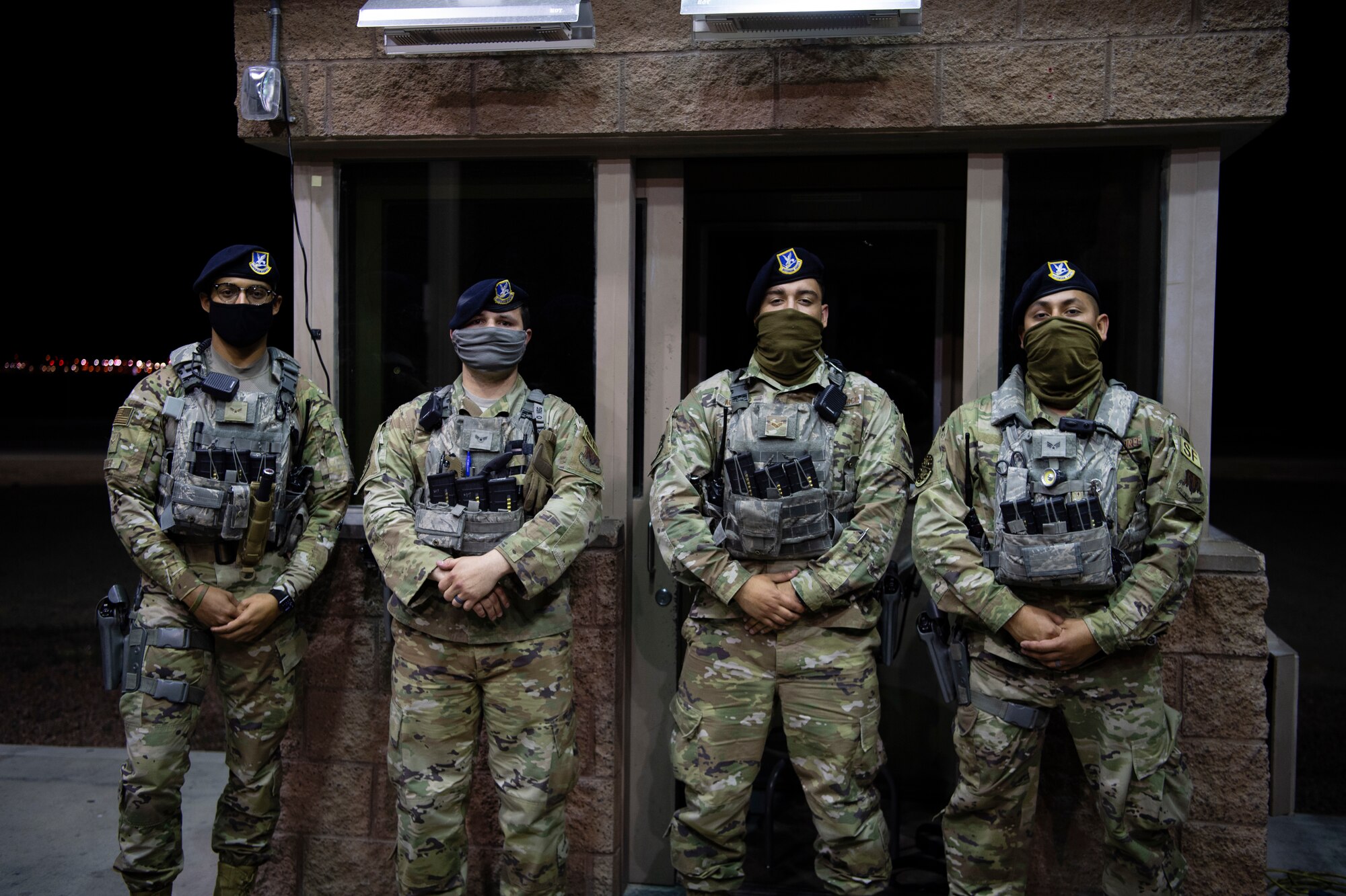 Defenders from the 432nd Security Forces Squadron pose for a photo during their nightshift at Creech Air Force Base.