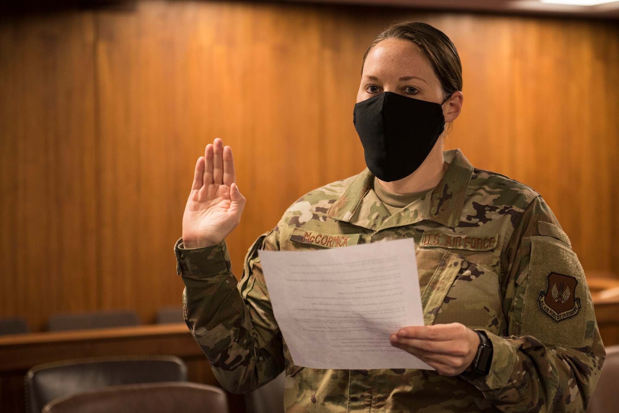 U.S. Air Force Capt. Lauren McCormick, 501st CSW Judge Advocate Office chief of operations and civil law, leads an oath during a will execution ceremony June 2, 2020, at RAF Alconbury, England. The 501st Combat Support Wing legal office hosted a deployment brief and will execution ceremony for all Security Forces deploying in the next 60 days. (U.S. Air Force photo by Airman 1st Class Jennifer Zima)