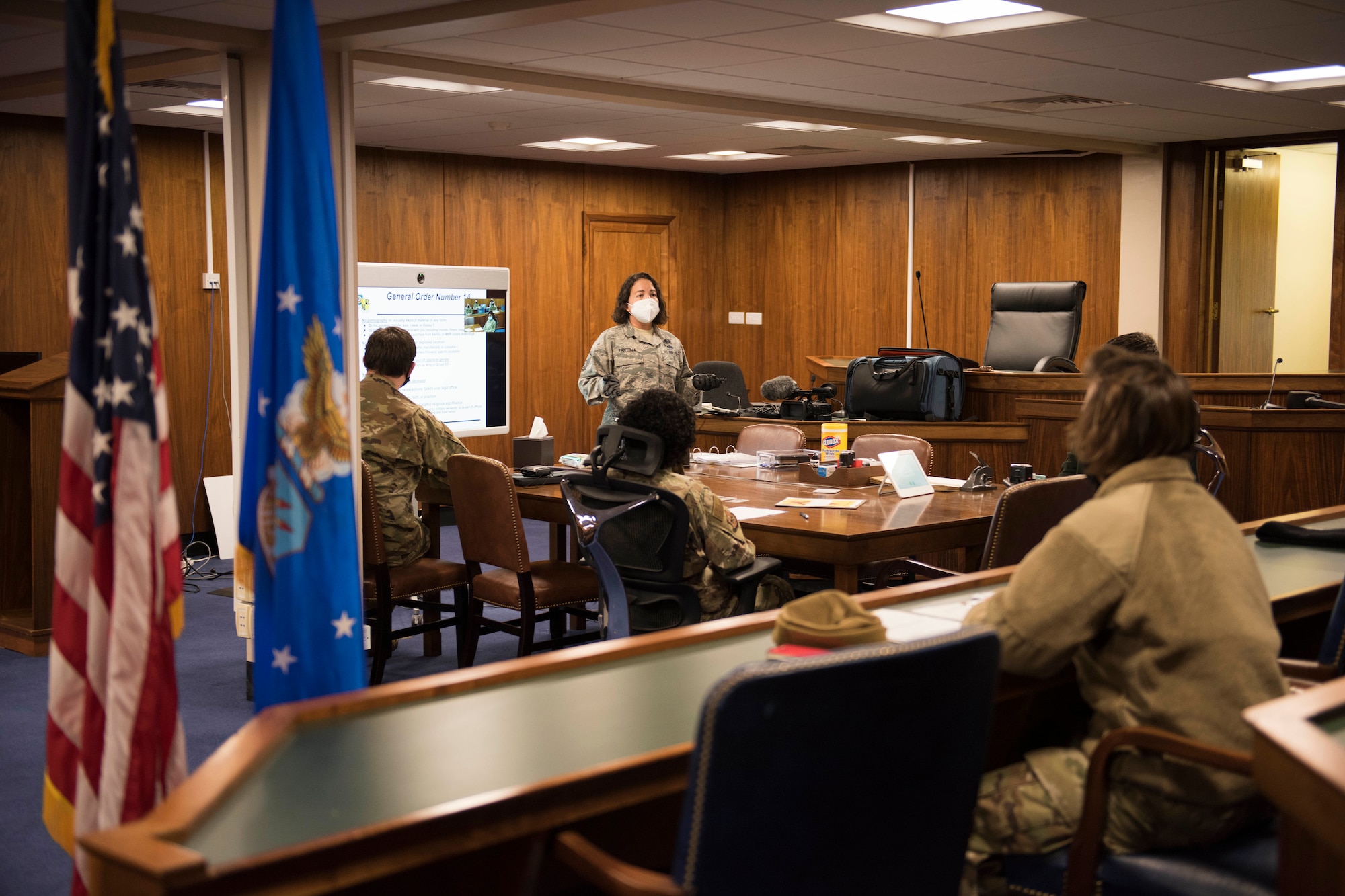 U.S. Air Force Master Sgt. Miriam Pantoja, 501st CSW Judge Advocate Office, NCOIC of general law, conducts a deployment brief June 2, 2020, at RAF Alconbury, England. The 501st Combat Support Wing legal office hosted a deployment brief and will execution ceremony for all Security Forces deploying in the next 60 days. (U.S. Air Force photo by Airman 1st Class Jennifer Zima)