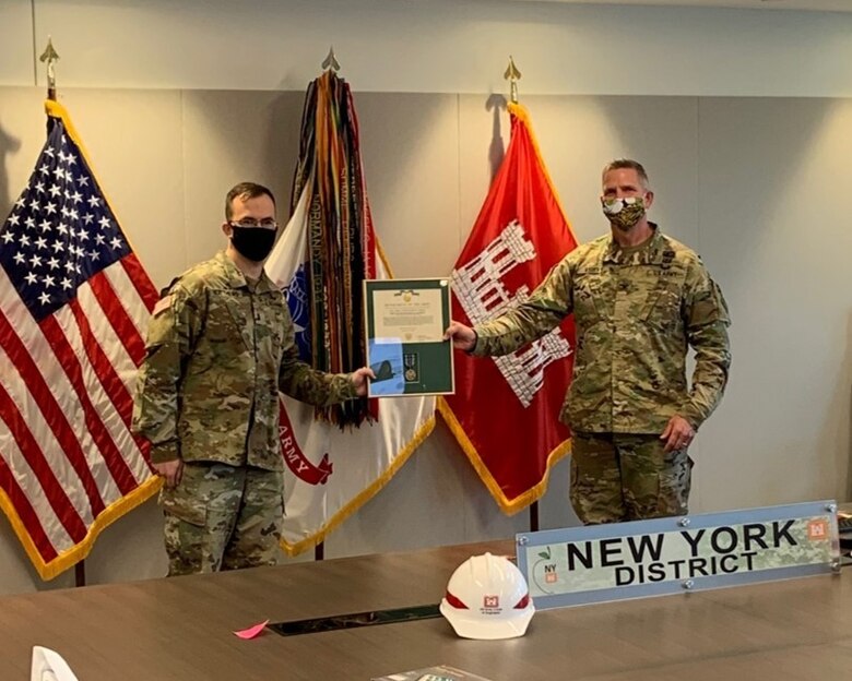 First Lt. Eoghan M. Matthews receives the Army Achievement Medal for his contributions during a deployment to New York City to assist the U.S. Army Corps of Engineers New York District with construction of several alternate care facilities in the fight against COVID-19.