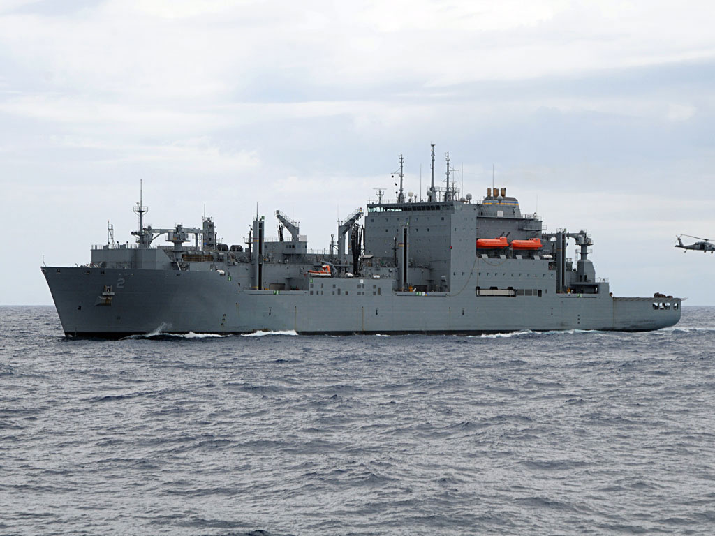 Dry Cargo/Ammunition Ship. Deliver supplies to customer ships at sea — ammunition, food, repair parts, stores and small quantities of fuel. Replace T-AE, T-AFS and T-AOE when operating with T-AO. Two dedicated ships provide ammunition, food, repair parts, stores and small quantities of fuel for the U.S. Marine Corps.
