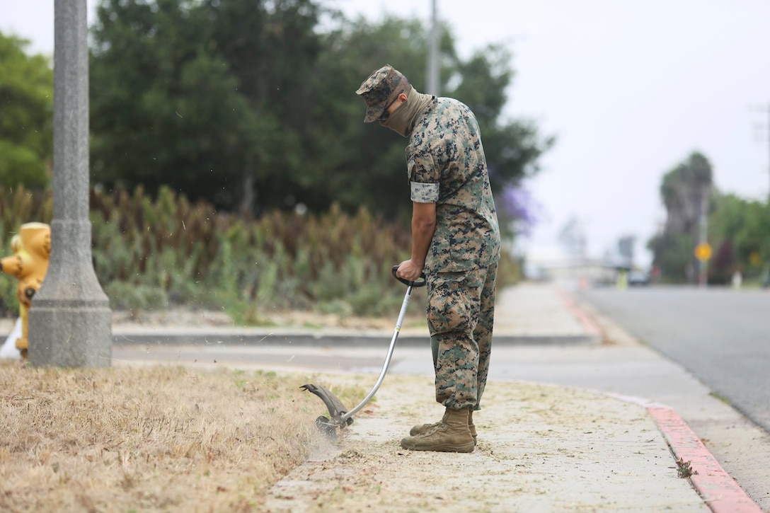 Marines from Marine Corps Air Station Miramar conduct a base-wide cleanup at MCAS Miramar, California, June 4, 2020.