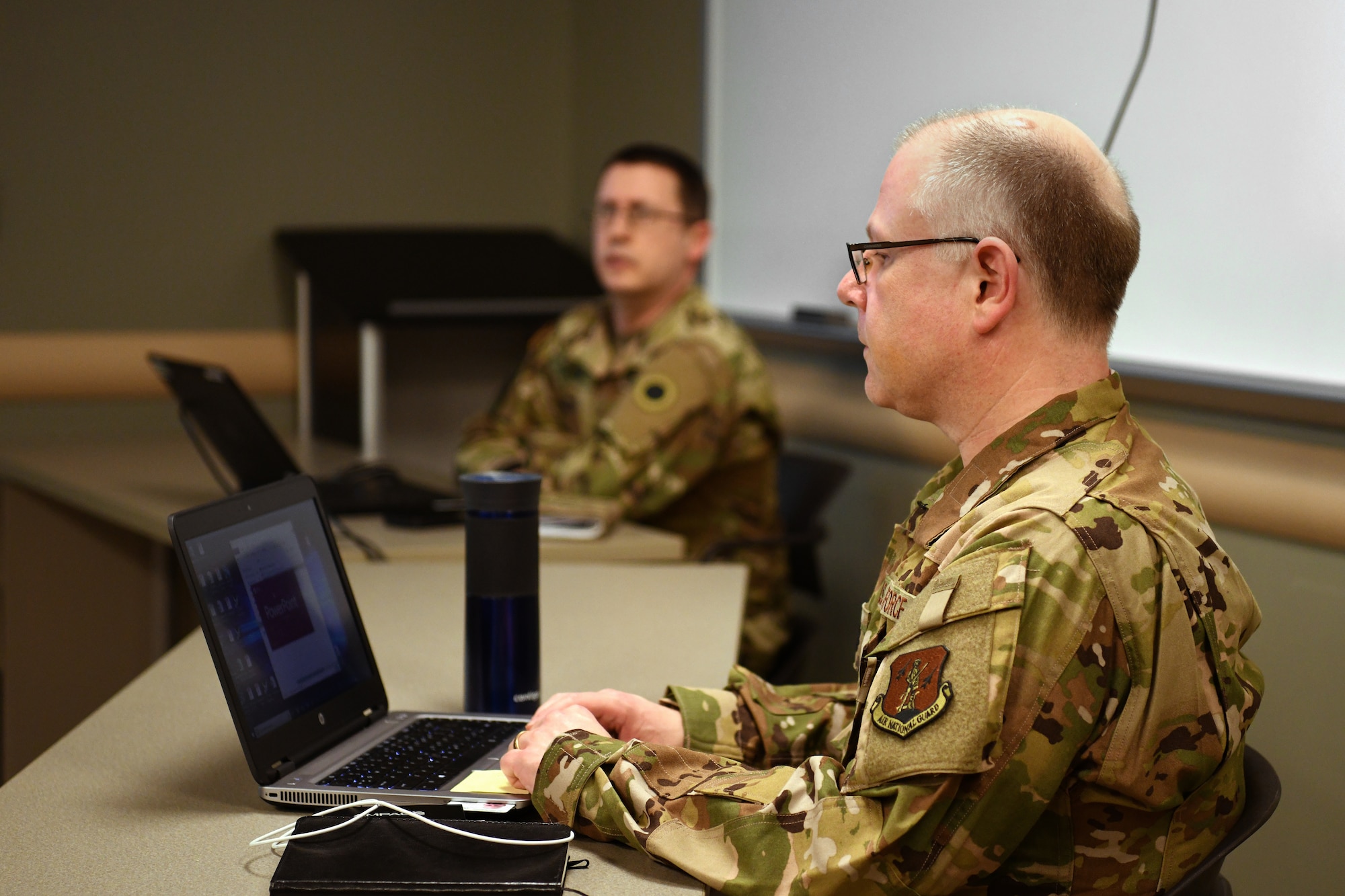 U.S. Air Force Lt. Col. (Dr.) Gary Katz, a flight surgeon assigned to the 178th Wing who was called to State Active Duty and is currently serving on Joint Task Force-37 for Operation Steady Resolve, prepares a medical briefing March 23, 2020 at the Defense Supply Center in Columbus, Ohio. Katz is one of more than 400 members of the Ohio National Guard called to support food distribution efforts at 12 locations across Ohio, serving more than 11 million Ohioans in all 88 counties. (U.S. Air National Guard photo by Tech. Sgt. Shane Hughes)