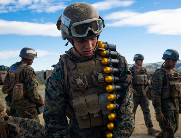 A U.S. Marine prepares 40 mm ammunition for a Mark 19 40 mm automatic grenade launcher live-fire range at Range 204B on Marine Corps Base Camp Pendleton, Calif., March 2.