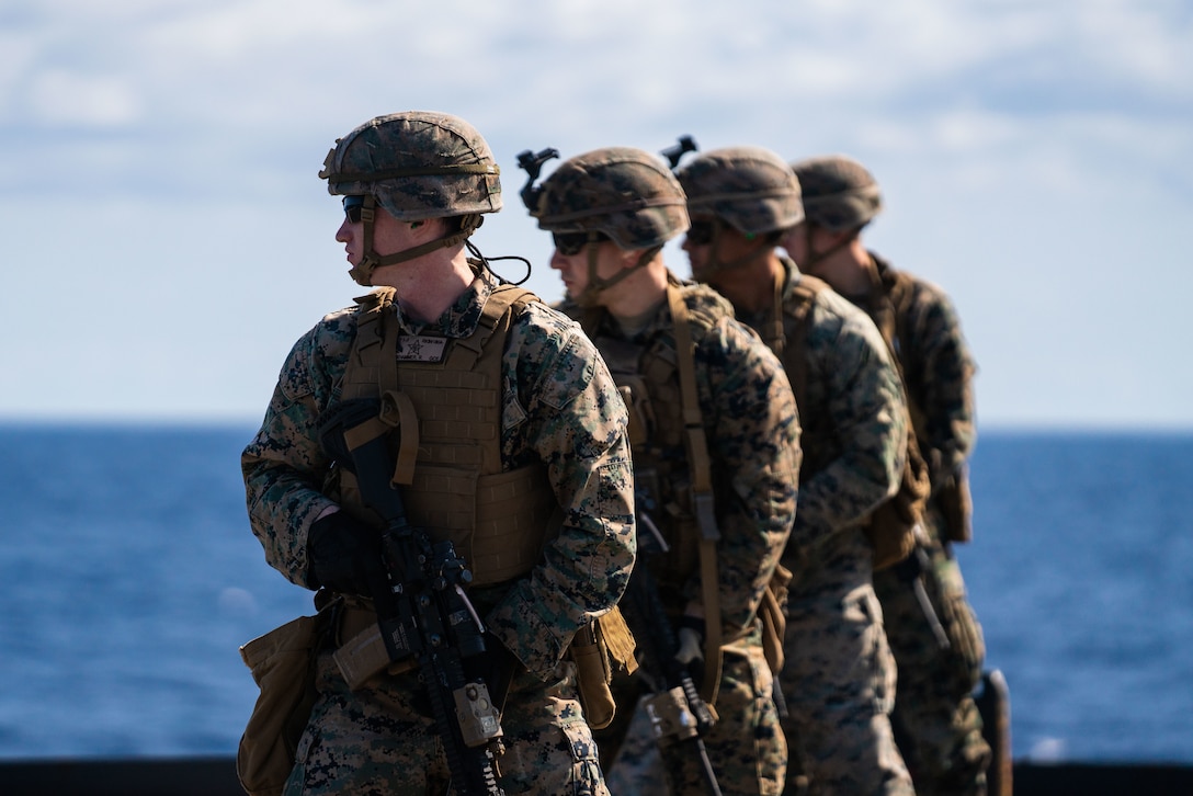 U.S. Marines identify their targets while conducting shooting drills aboard the Whidbey Island-class dock landing ship USS Germantown (LSD 42), March 1.