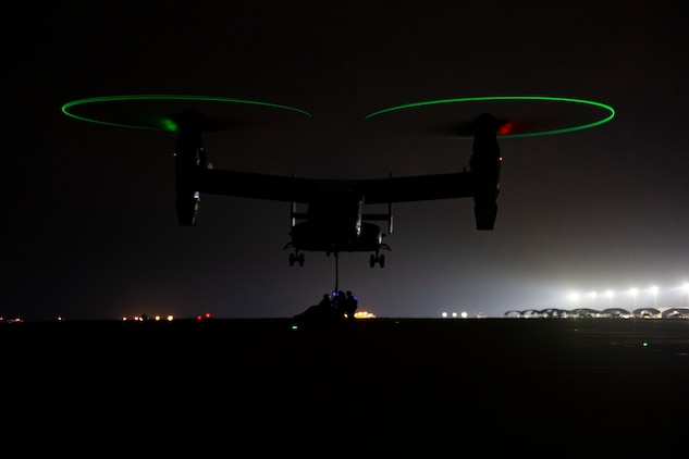 U.S. Marines secure a cargo bundle during external lift training at Morón Air Base, Spain, March 25.