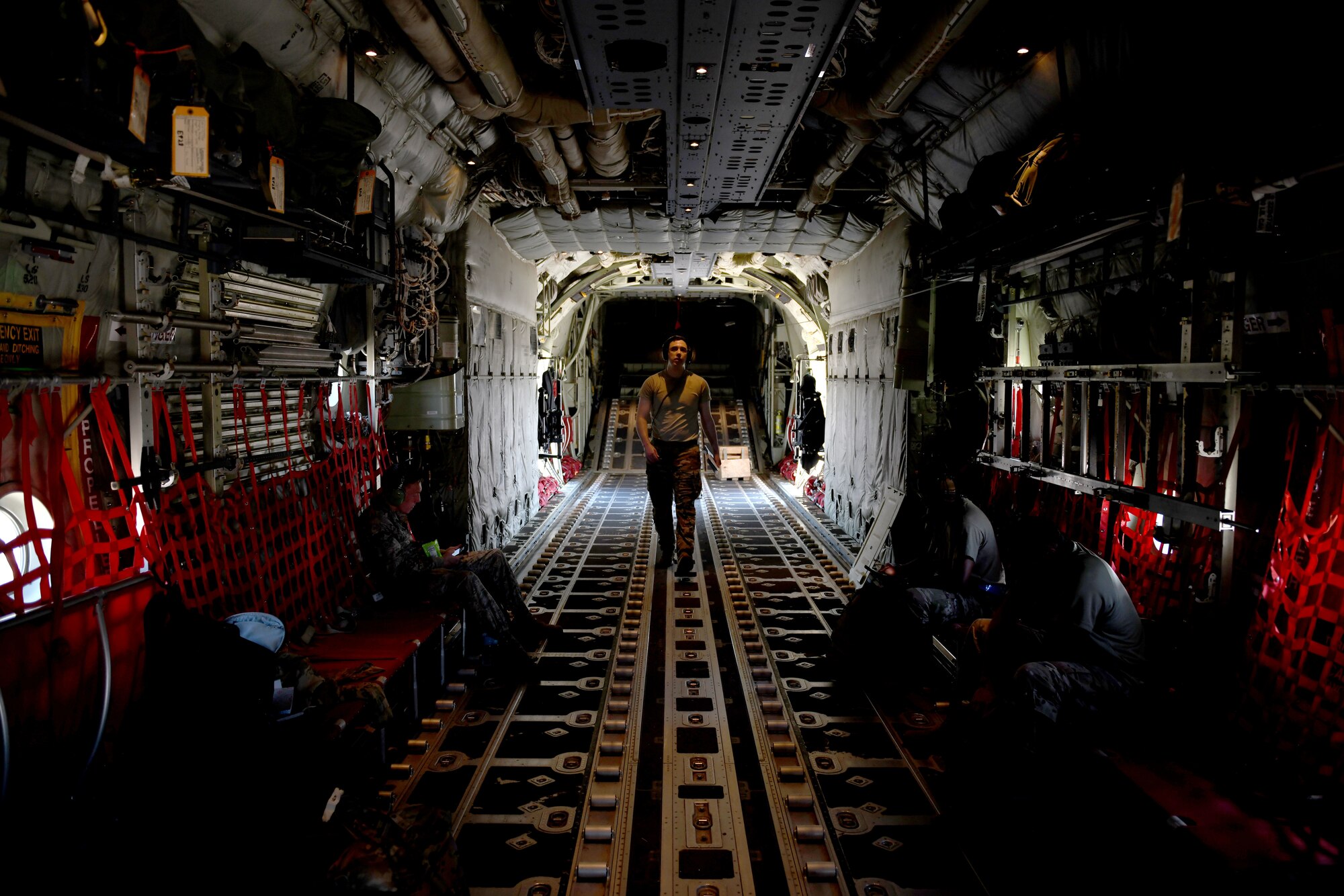 A loadmaster assigned to the 61st Airlift Squadron prepares a C-130J Super Hercules for flight at Little Rock Air Force Base, Arkansas, June 6, 2020. More than 20 C-130Js and C-17 Globemaster IIIs flew in formation during the U.S. Air Force Weapons School’s Joint Forcible Entry exercise with numerous other aircraft from across the Air Force. (U.S. Air Force photo by Senior Airman Kristine M. Gruwell)