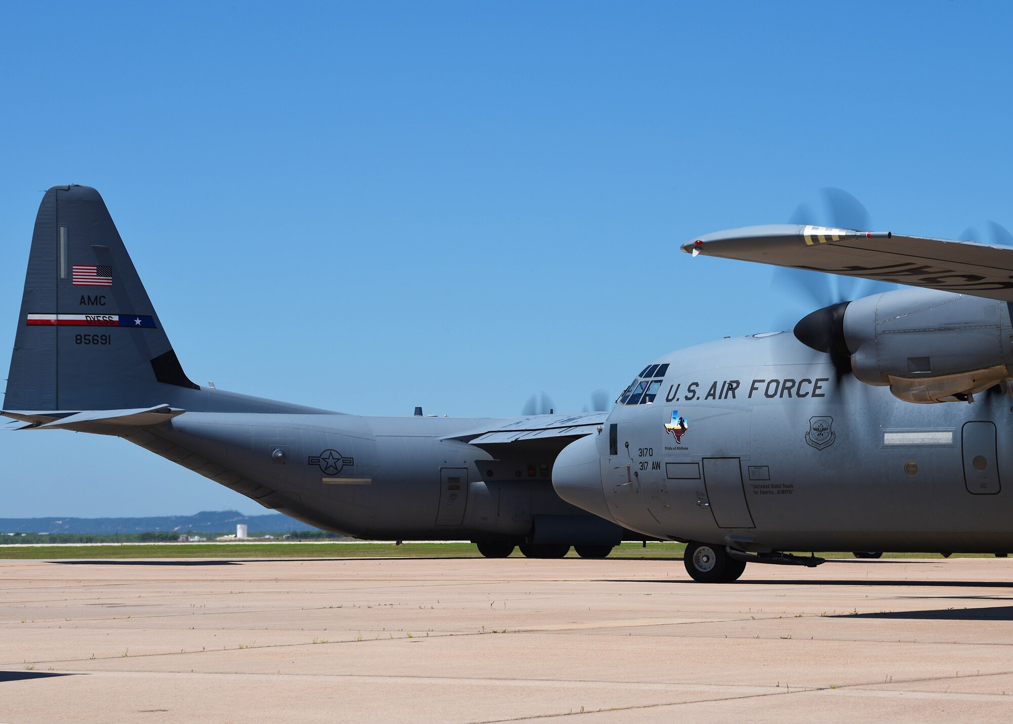 Two C-130J Super Hercules taxi along the flightline at Dyess Air Force Base, Texas in preparation of the U.S. Air Force Weapons School Joint Forcible Entry exercise June 6, 2020. Participating students plan and execute an air-land operation in a simulated contested battlefield at Nellis AFB, Nev. (U.S. Air Force photo by Senior Airman Mercedes Porter)