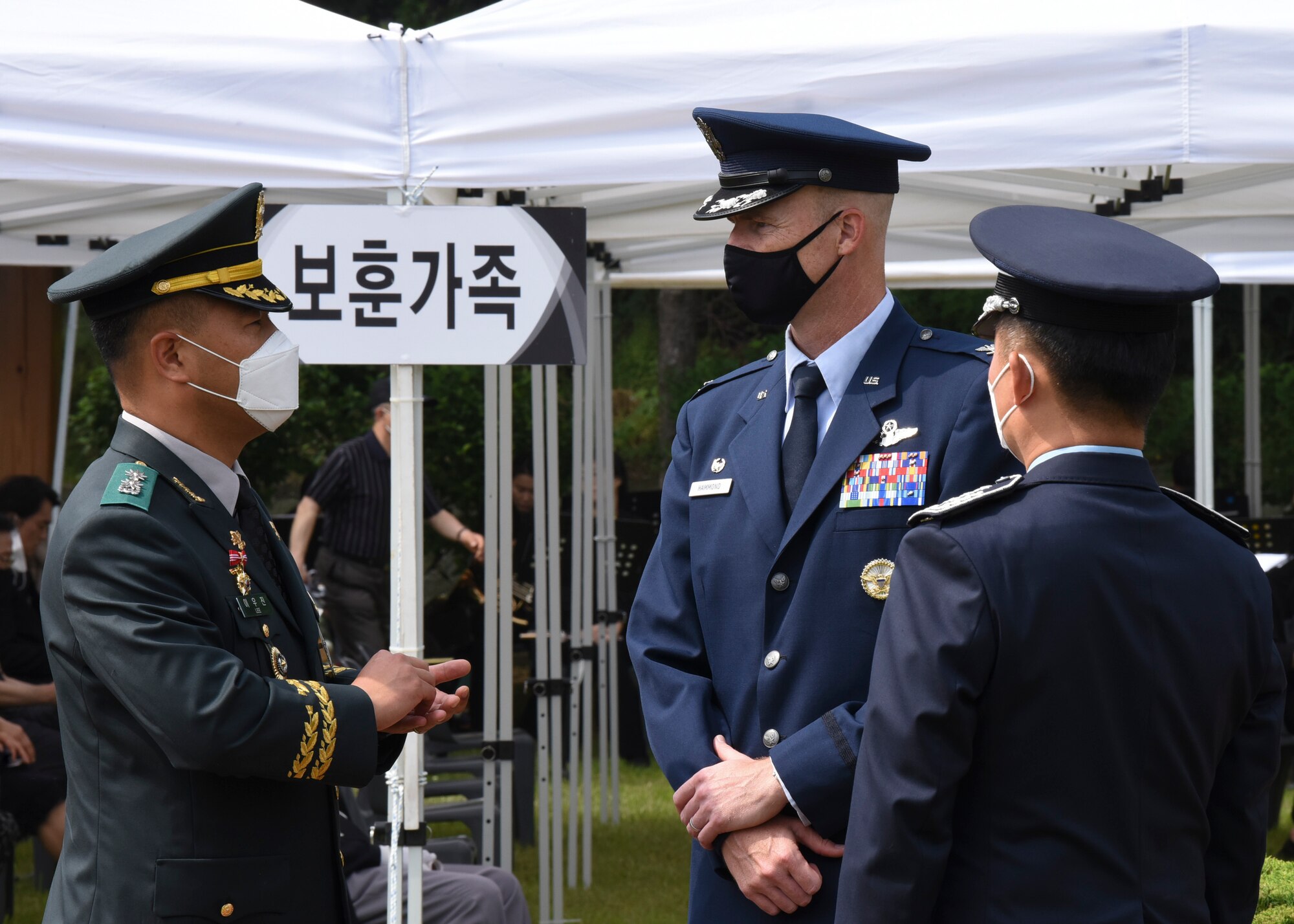 U.S. Air Force Col. Chris Hammond, 8th Fighter Wing commander, greets military leaders from the Republic of Korea including Lt. Col. Woo-Jin Yi, 35th Army Division commander, prior to the Korean Memorial Day ceremony in Gunsan City, Republic of Korea, June 6, 2020. Korean Memorial Day is a national holiday which commemorates the lives of Korean citizens who died while serving in the military and those who lost their lives during the independence movement. (U.S. Air Force photo by Staff Sgt. Anthony Hetlage)