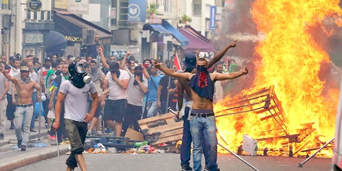 French Muslim youths rioting in Paris during a July 2014 anti-Israel demonstration.