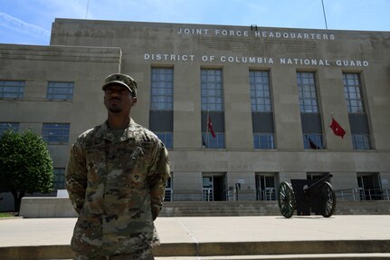 Spc. Khaled Abdelghany, 273rd Military Police Company, District of Columbia National Guard, stands in front of the D.C. Armory in Washington, D.C June 9, 2020.