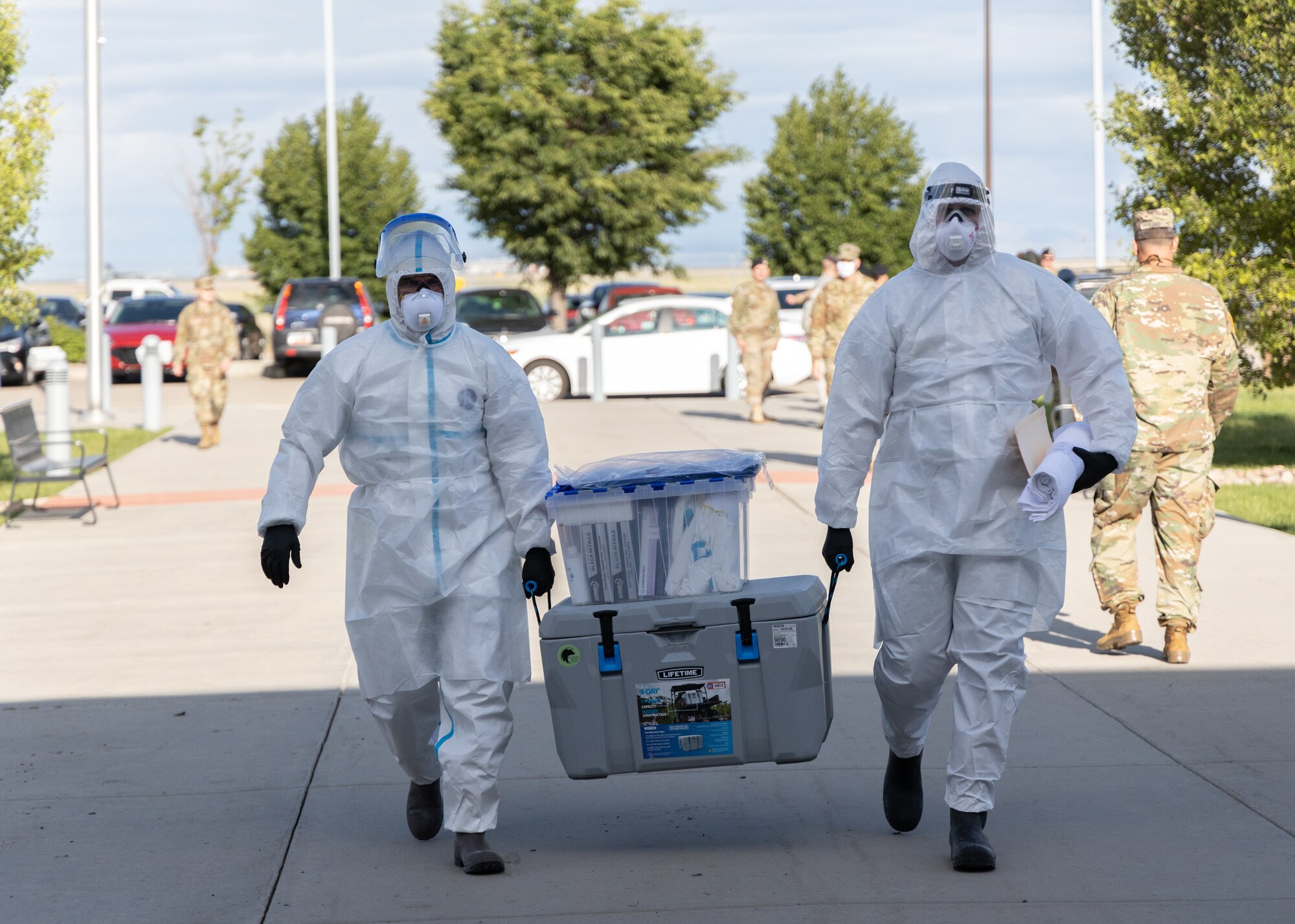 Utah National Guard Mobile Testing Team members prepare to conducts a nasopharyngeal sample collection on Soldiers in Salt Lake City to test if they are carriers of the novel coronavirus, COVID-19, May 27, 2020. To collect a sample a flocked swab is sent through the nasal cavity and will stay there for 20 seconds, be twisted and removed.