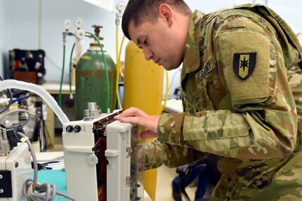 A Soldier repairs a medical device at the U.S. Army Medical Materiel Agency’s Medical Maintenance Operations Division at Tobyhanna Army Depot in Pennsylvania.