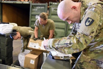 Soldiers from the 28th Combat Support Hospital take part in a joint inventory at Sierra Army Depot in Herlong, California, before medical equipment and supplies are shipped to their home station at Fort Bragg, North Carolina.