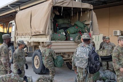 Soldiers get on truck