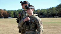 Soldiers don the Integrated Visual Augmentation System (IVAS) Capability Set 2 (CS 2) Heads Up Display (HUD) at Soldier Touchpoint 2 (STP 2) in November 2019 at Fort Pickett, Va.